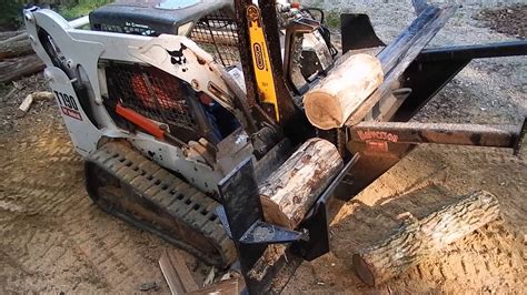 youtube skid steer wood splitter|bobcat attachments wood cutter splitter.